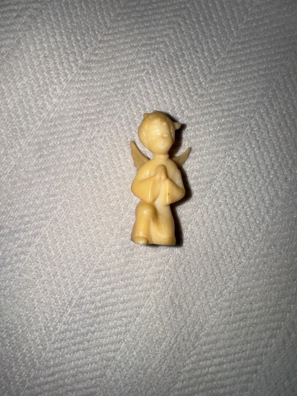 Angelic vintage plastic praying angel ornament